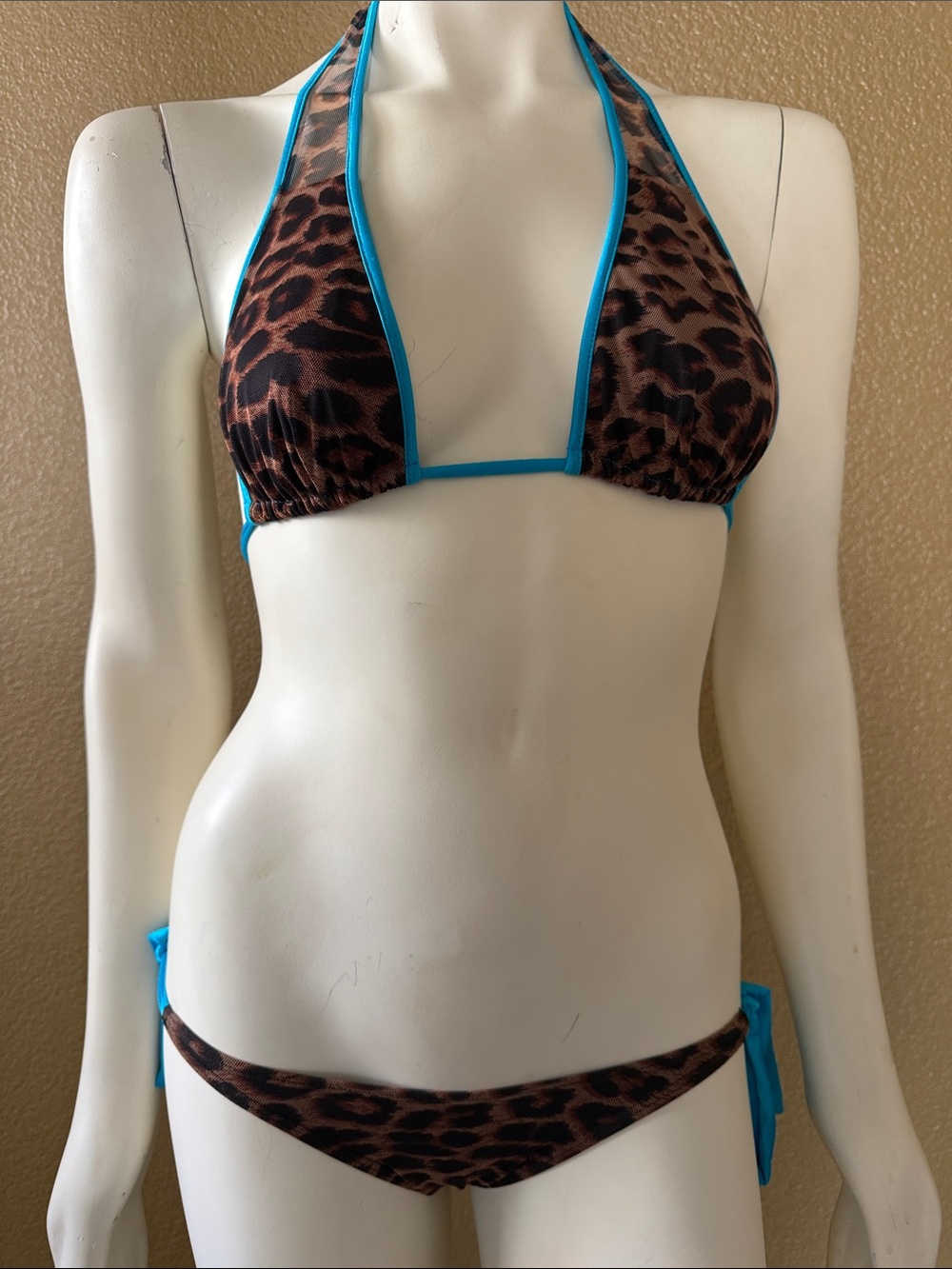 This was hand made at a swim/dance shop. O/S Bottoms run small can be adjusted